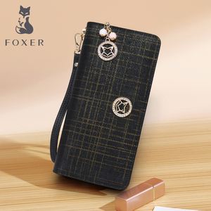 金狐狸钱包什么档次-金狐狸包包的标志图片